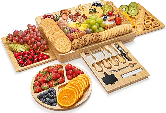 cheese board  with 4 different compartments and tools for entertaining