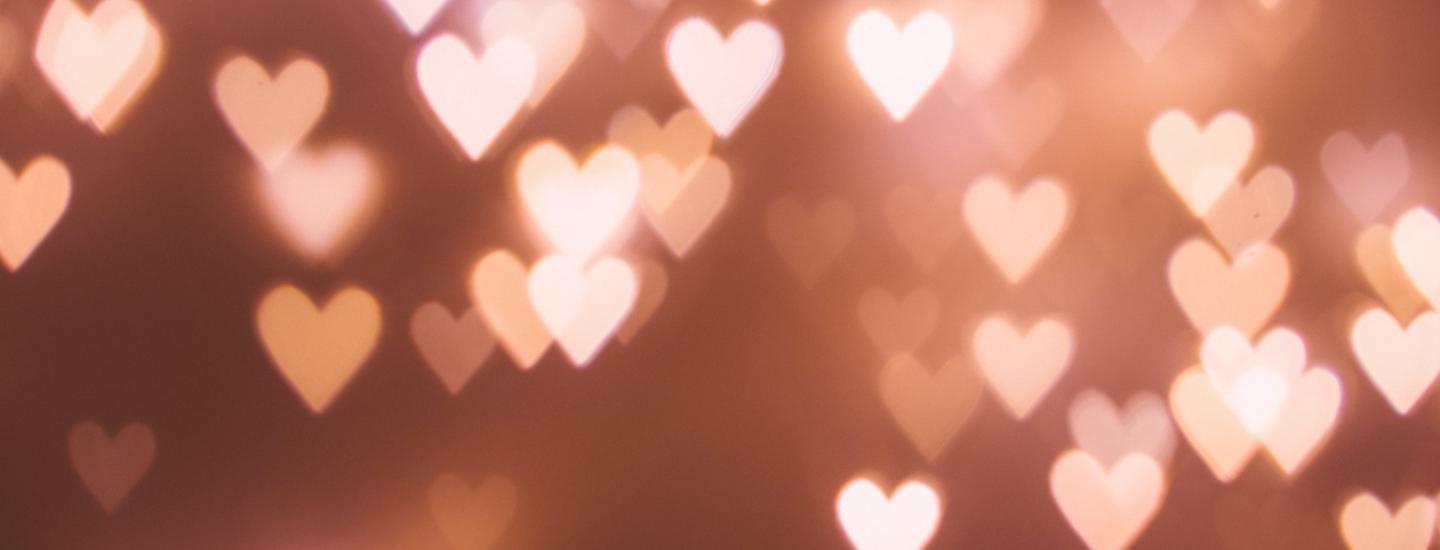 blurred faded hearts background image